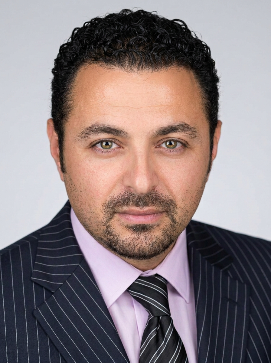 Professional headshot of Shimon Leizgold, also known as Simon Leizgold